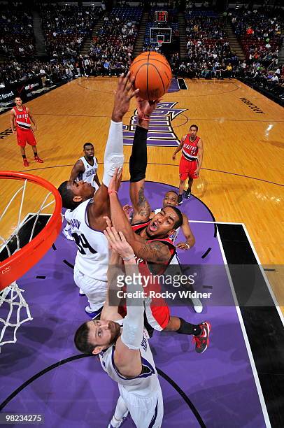 LaMarcus Aldridge of the Portland Trail Blazers gets to the basket against Andres Nocioni of the Sacramento Kings on April 3, 2010 at ARCO Arena in...