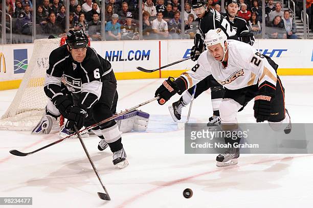 Sean O'Donnell of the Los Angeles Kings reaches for the puck against Kyle Chipchura of the Anaheim Ducks on April 3, 2010 at Staples Center in Los...