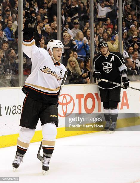 Saku Koivu of the Anaheim Ducks celebrates his goal to tie the score 1-1 in front of Anze Kopitar of the Los Angeles Kings during the third period at...