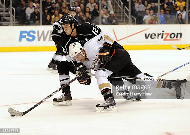 Bobby Ryan of the Anaheim Ducks stretches to get a shot past Randy Jones of the Los Angeles Kings during the third period at the Staples Center on...