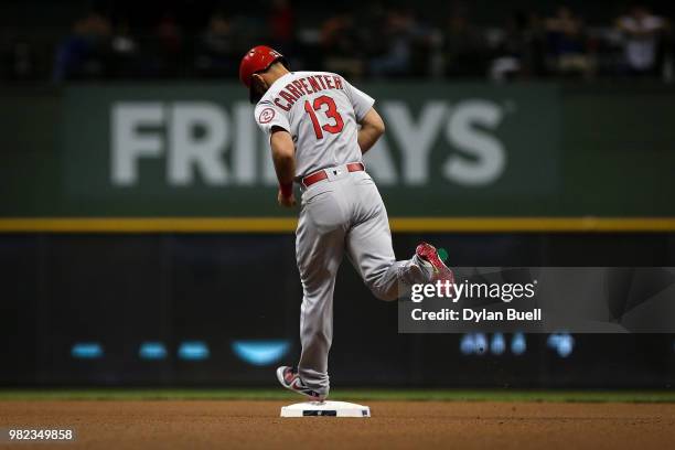 Matt Carpenter of the St. Louis Cardinals rounds the bases after hitting a home run in the first inning against the Milwaukee Brewers at Miller Park...