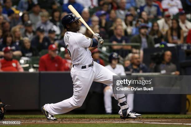 Lorenzo Cain of the Milwaukee Brewers hits a single in the first inning against the St. Louis Cardinals at Miller Park on June 21, 2018 in Milwaukee,...