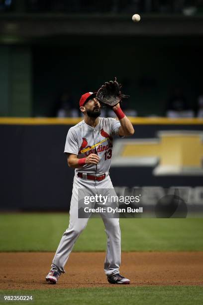 Matt Carpenter of the St. Louis Cardinals catches a pop fly in the second inning against the Milwaukee Brewers at Miller Park on June 21, 2018 in...