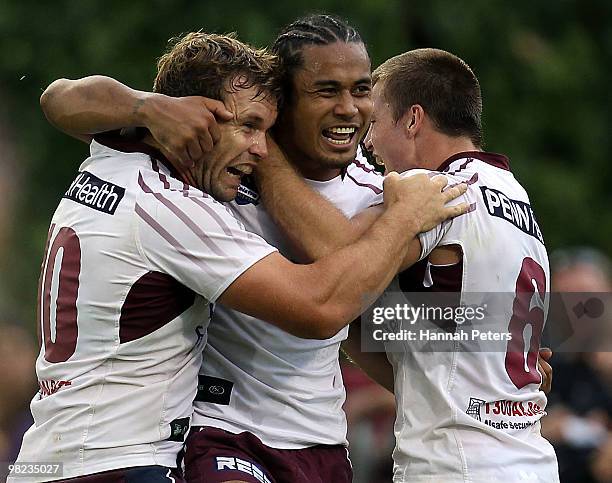 Steve Matai of the Sea Eagles celebrates with Josh Perry and Kieran Foran after scoring during the round four NRL match between the New Zealand...