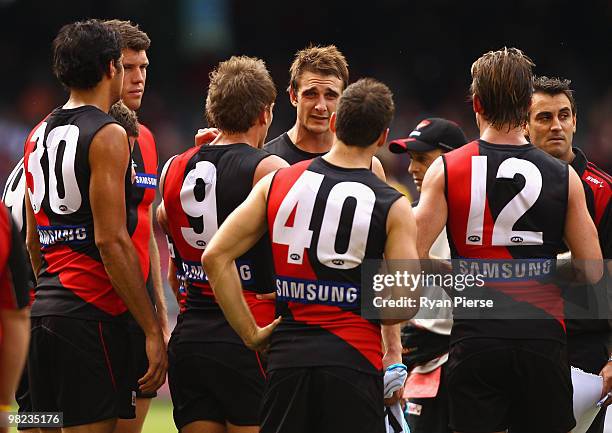 Jobe Watson, captain of the Bombers, addresses his team mates during the round two AFL match between the Essendon Bombers and the Fremantle Dockers...