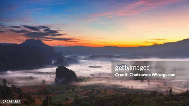 mountain&mist - wiratgasem stock pictures, royalty-free photos & images