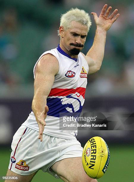 Jason Akermanis of the Bulldogs kicks the ball during the round two AFL match between the Richmond Tigers and the Western Bulldogs at Melbourne...