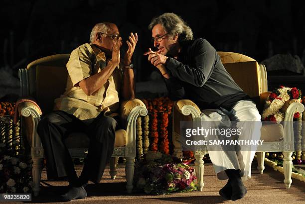 French creative director Yves Pepin speaks with Indian nuclear scientist R. Chidambaram interact during the inauguration ceremony for The...