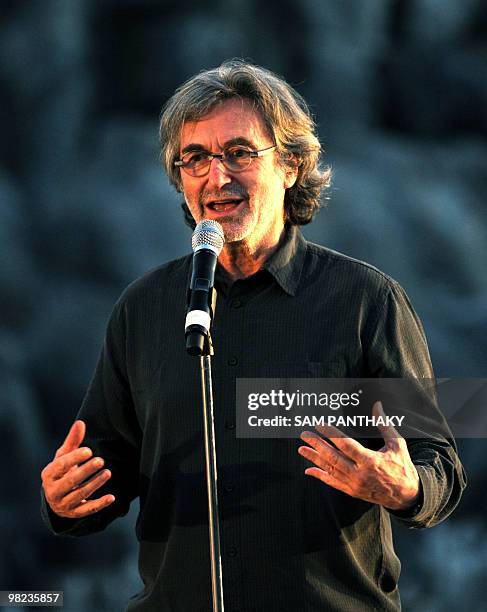 French creative director Yves Pepin gestures as he addresses a gathering during the inaugural ceremony for the Sat-Chit-Anand Water Show at The...