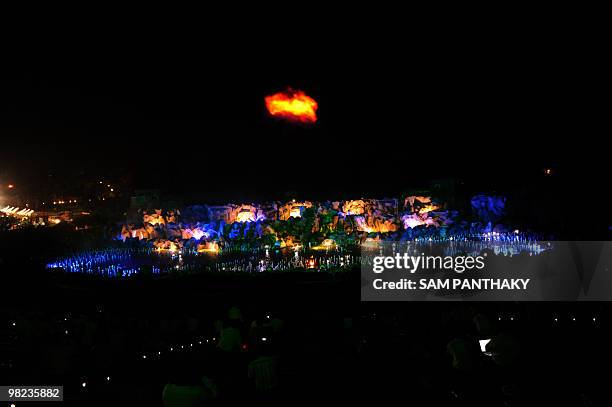 Officials watch a perfomance of The Sat-Chit-Anand Water Show at The Bochasanwasi Shri Akshar-Purshottam Swaminarayan Sansthan Akshardham in...