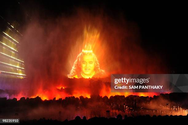 Officials watch a perfomance of The Sat-Chit-Anand Water Show at Bochasanwasi Shri Akshar-Purshottam Swaminarayan Sansthan's Akshardham in...