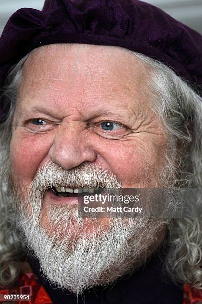 Lord Bath laughs as he begins to paint a lion given to him by the Lions of Bath public art project to decorate in his studio at Longleat House on...