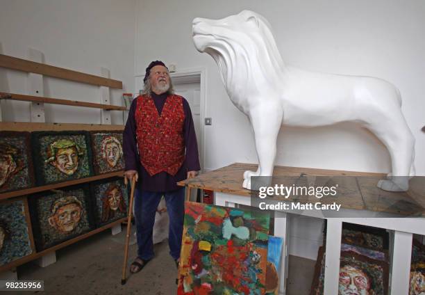 Lord Bath begins to paint a lion given to him by the Lions of Bath public art project to decorate in his studio at Longleat House on April 1, 2010...