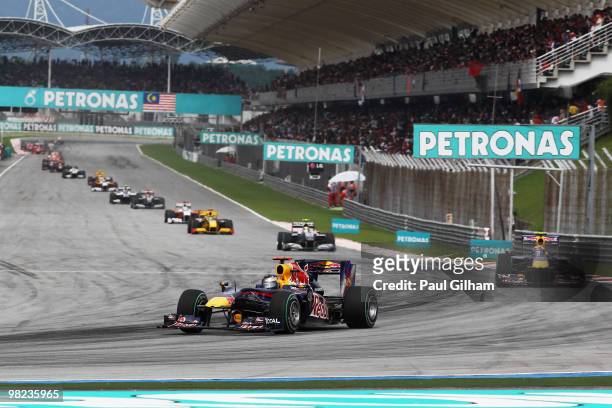 Sebastian Vettel of Germany and Red Bull Racing leads at the start of the the Malaysian Formula One Grand Prix at the Sepang Circuit on April 4, 2010...