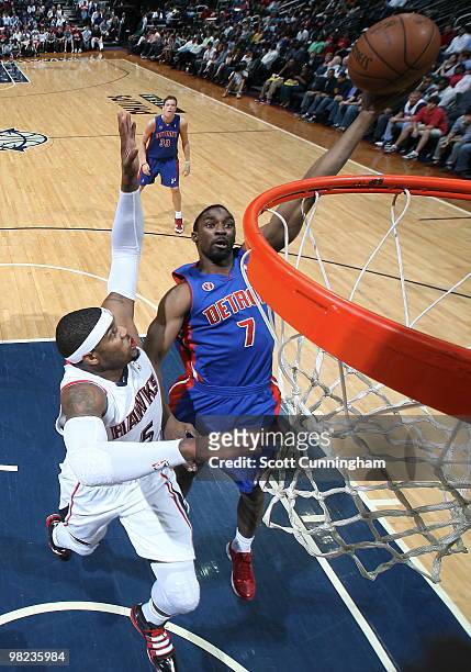 Ben Gordon of the Detroit Pistons puts up a shot against Josh Smith of the Atlanta Hawks on April 3, 2010 at Philips Arena in Atlanta, Georgia. NOTE...