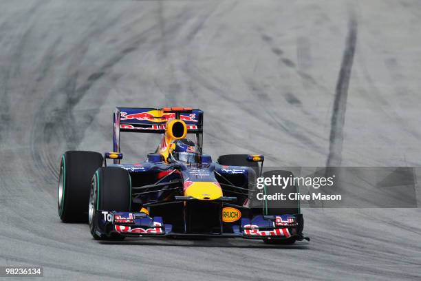 Sebastian Vettel of Germany and Red Bull Racing drives during the Malaysian Formula One Grand Prix at the Sepang Circuit on April 4, 2010 in Kuala...