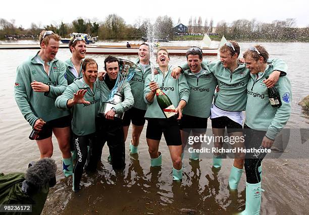 The Cambridge crew celebrate victory after the 156th Oxford and Cambridge University Boat Race on the River Thames on April 3, 2010 in London,...