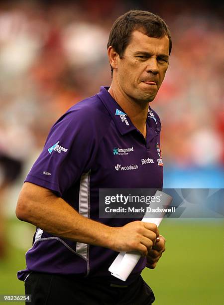 Mark Harvey coach of the Dockers leaves the field at three quarter time during the round two AFL match between the Essendon Bombers and the Fremantle...