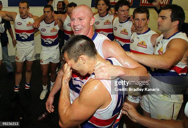Team mates Barry Hall and Brodie Moles of the Bulldogs celebrate victory after the round two AFL match between the Richmond Tigers and the Western...