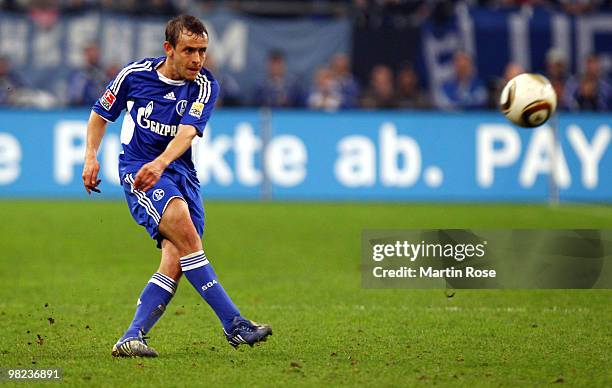 Rafinha of Schalke kicks the ball during the Bundesliga match between FC Schalke 04 and FC Bayern Muenchen at the Veltins Arena April 3, 2010 in...