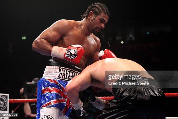 David Haye of England punches out as John Ruiz of USA covers up during the World Heavyweight Bout at the MEN Arena on April 3, 2010 in Manchester,...