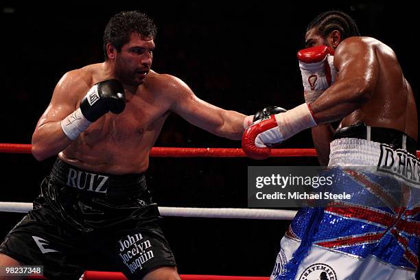 John Ruiz of USA hits out at David Haye of England during the World Heavyweight Bout at the MEN Arena on April 3, 2010 in Manchester, England.