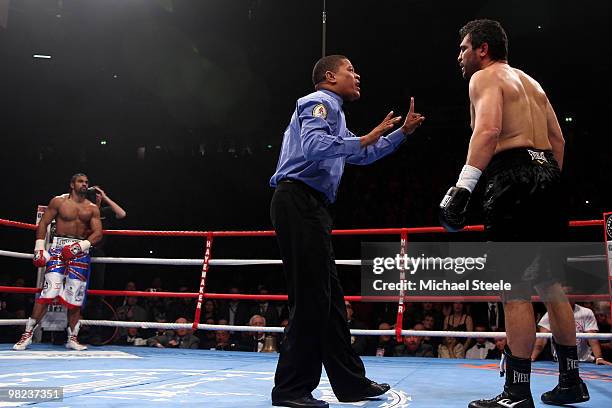 David Haye of England waits in a neutral corner as John Ruiz of USA is given a mandatory count by the referee during the World Heavyweight Bout at...