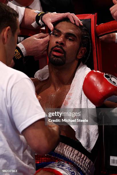 David Haye of England receives treatment from his cornermen in between rounds during his bout against John Ruiz of USA during the World Heavyweight...