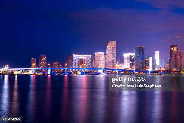 city skyline behind the access to port facilities, downtown, miami, florida, united states - port stephens stock pictures, royalty-free photos & images