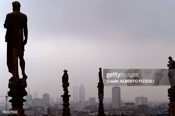 The Milan skyline is seen from the roof of Milan cathedral Dome in Milan on March 22, 2010. Milan is the provincial capital of the Lombardia region,...