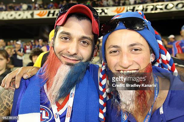 Bulldogs fans show their colours during the round two AFL match between the Richmond Tigers and the Western Bulldogs at Melbourne Cricket Ground on...