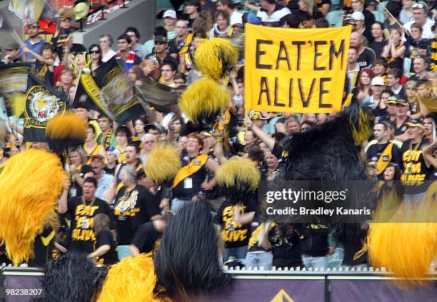 Tigers fans show their colours during the round two AFL match between the Richmond Tigers and the Western Bulldogs at Melbourne Cricket Ground on...