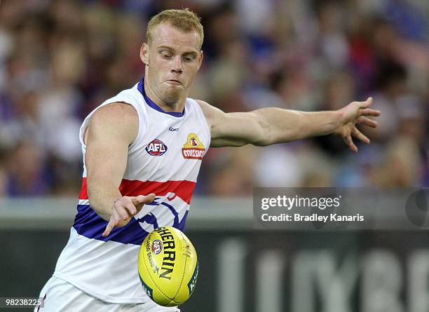 Adam Cooney of the Bulldogs kicks the ball during the round two AFL match between the Richmond Tigers and the Western Bulldogs at Melbourne Cricket...