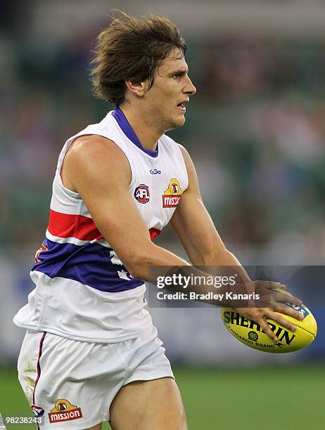 Ryan Griffen of the Bulldogs kicks the ball during the round two AFL match between the Richmond Tigers and the Western Bulldogs at Melbourne Cricket...