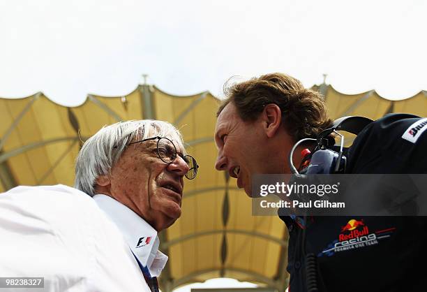Supremo Bernie Ecclestone talks with Red Bull Racing Team Principal Christian Horner before the Malaysian Formula One Grand Prix at the Sepang...