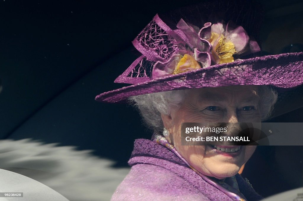 Britain's Queen Elizabeth II holds flowe