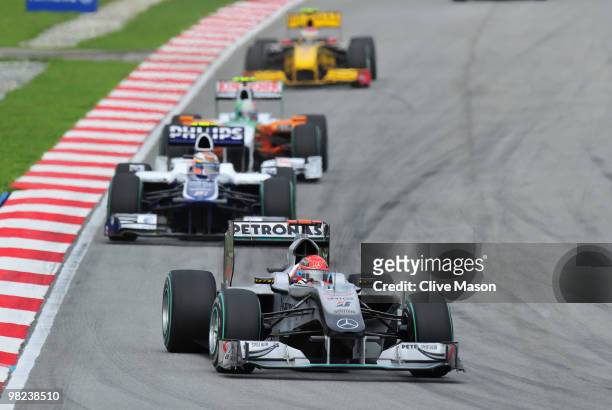 Michael Schumacher of Germany and Mercedes GP drives during the Malaysian Formula One Grand Prix at the Sepang Circuit on April 4, 2010 in Kuala...
