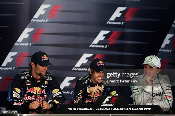 Winner Sebastian Vettel of Germany and Red Bull Racing, second placed Mark Webber of Australia and Red Bull Racing and third placed Nico Rosberg of...