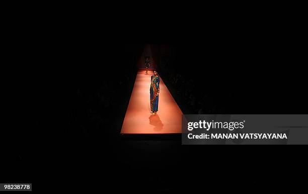 Model presents creation by Indian designers Ashima-Leena during the Wills India Fashion Week Autumn-Winter 2010 in New Delhi on March 25, 2010....