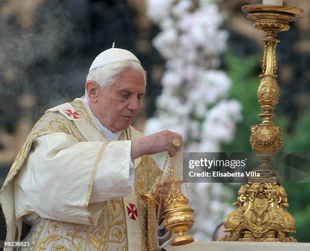 Pope Benedict XVI celebrates Easter Holy Mass in St Peter's Square on April 4, 2010 in Vatican City, Vatican. The ceremony began with Cardinal Angelo...