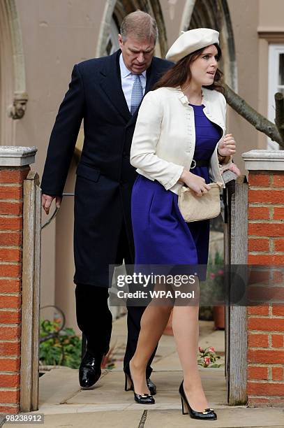Prince Andrew, The Duke of York and Princess Eugenie attend the traditional Easter Sunday church service at St. George's Chapel on April 4, 2010 in...