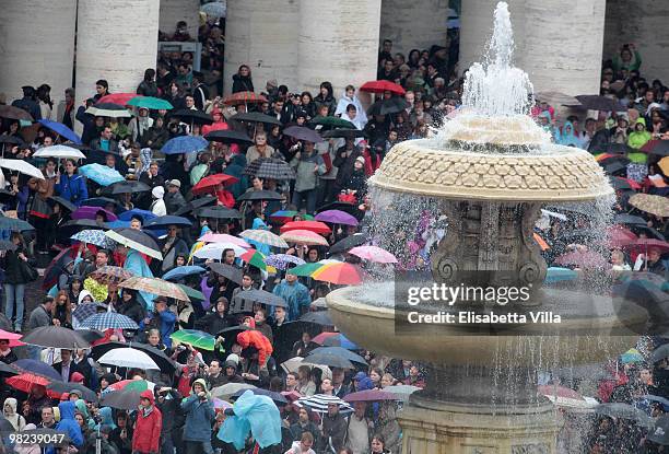 Pilgrims attend the Easter Holy Mass in St Peter's Square on April 4, 2010 in Vatican City, Vatican. The ceremony began with Cardinal Angelo Sodano...