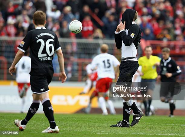 Adam Nemec of Kaiserslautern reacts as players of Oberhausen celebrate their second goal scored from a penalty kick by Markus Kaya during the Second...