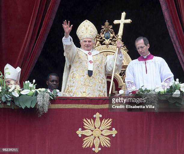 Pope Benedict XVI delivers his 'urbi et orbi' blessing from the central balcony of St Peter's Basilica on April 4, 2010 in Vatican City, Vatican. The...