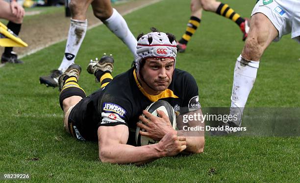 Dan Ward-Smith of Wasps dives over to score a try during the Guinness Premiership match between London Wasps and London Irish at Adams Park on April...