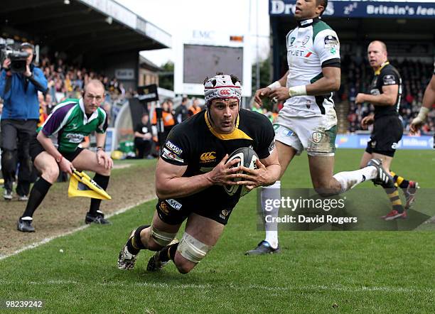 Dan Ward-Smith of Wasps dives over to score a try during the Guinness Premiership match between London Wasps and London Irish at Adams Park on April...