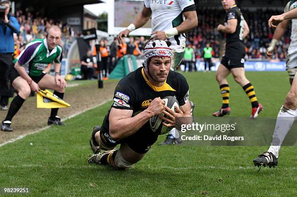 Dan Ward-Smith of Wasps dives over to score a try during the Guinness Premiership match between London Wasps and London Irish at Adams Park on April...