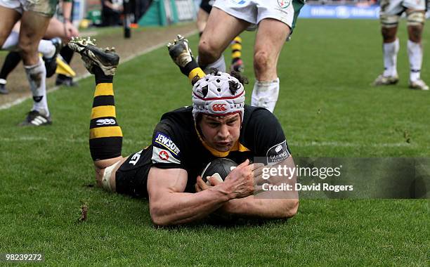 Dan Ward-Smith of Wasps dives over to score a try during the Guinness Premiership match between London Wasps and London Irish at Adams Park on April...