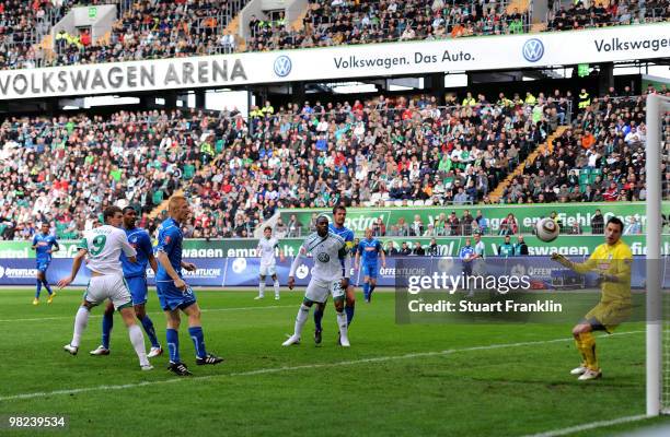 Edin Dzeko of Wolfsburg scores his team's first goal during the Bundesliga match between VfL Wolfsburg and 1899 Hoffenheim at Volkswagen Arena on...