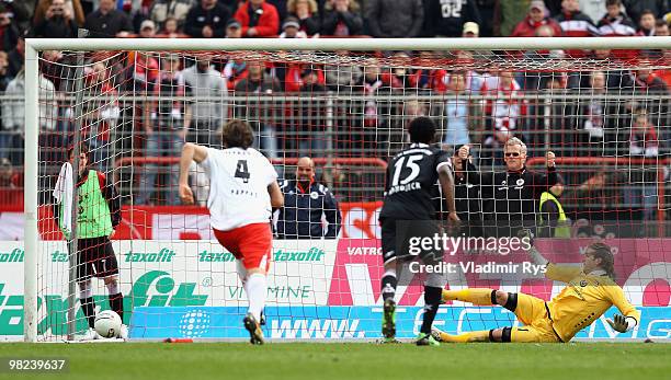 Tobias Sippel of Kaiserslautern concedes the second goal scored from a penatly kick by Markus Kaya of Oberhausen during the Second Bundesliga match...